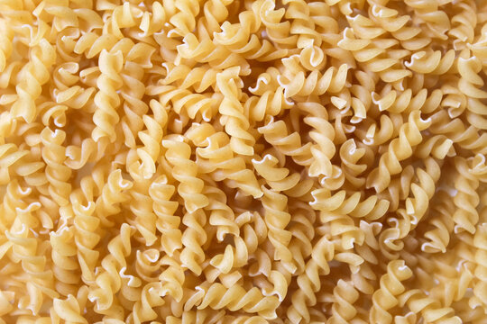 top view of a stack of fusilli pasta