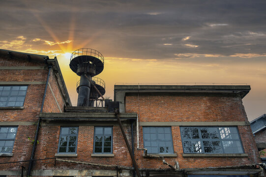 Sunset Over an Old Industrial Factory