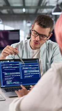 Programmer Writes Clean Code On Computer While Collaborating