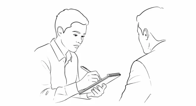 A man taking notes in a notebook while interviewing another man