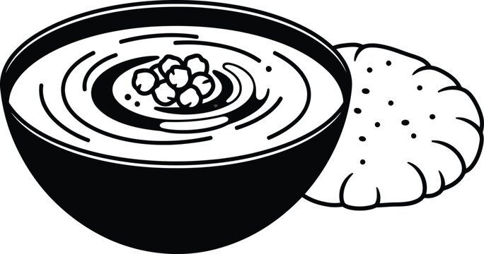 Black bowl of soup with bread black and white food