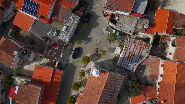 Vertical Drone View Over Central Church and Square in Traditional Laneia Village Cyprus