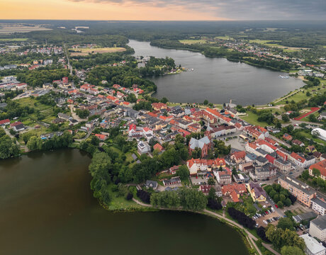 Red-roof aerial panorama of Wałcz with lakes, forest and surrounding fields in Zachodniopomorskie, Poland.