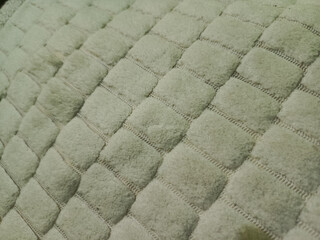 Fototapeta premium Close-up of quilted fabric texture.
