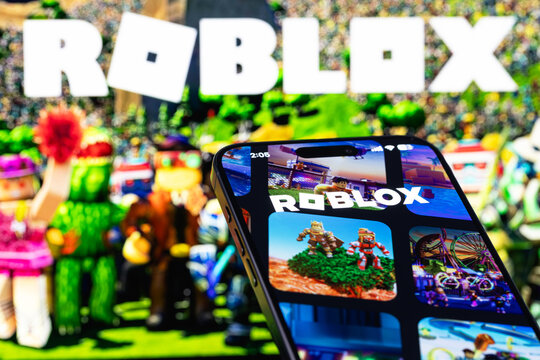 Roblox logo mobile app on a screen smartphone iPhone. Roblox is an online gaming platform and game creation system. Batumi, Georgia - March 20, 2026