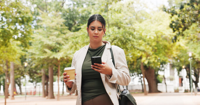 Businesswoman, commute and coffee in park with phone, public relations job or check for email update. Person, walk or scroll outdoor with tech, review press release and drink for travel to PR agency.