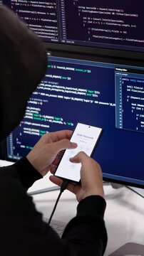 Hacker Carefully Types On Computer Trying