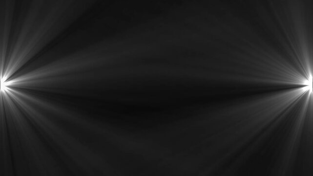 Stage light beam shining on black background for overlay effect.