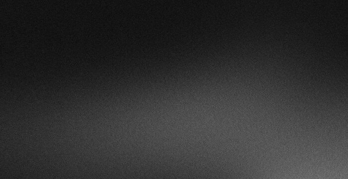 Deep black grain texture dominates the frame. Fine, uniform speckles cover every inch of surface. Dark, dense pattern offers a minimalist backdrop. Ideal for design elements or digital overlays