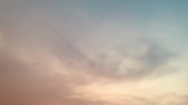 Soft pastel sunset sky in 4K with smooth cloud textures and gentle gradient tones. Ideal for background, nature, calm mood, mindfulness, travel, and inspirational visual themes.