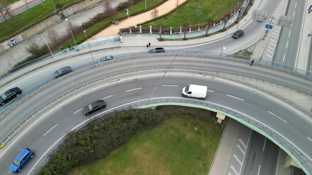 Istanbul/Turkey circa 2023: following drone shot white van driving on the road