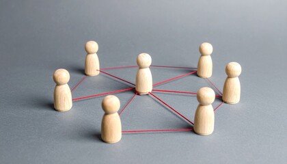 Obraz premium Central figurine connected by red strings.