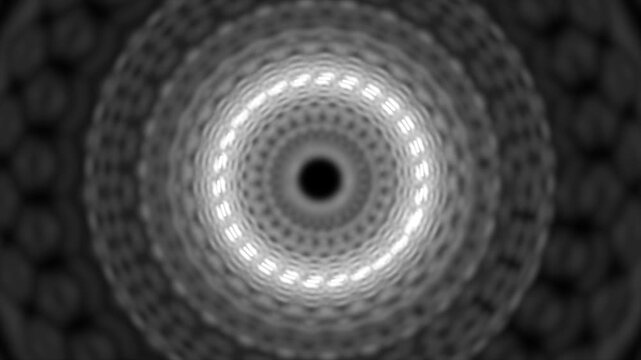 Abstract radial geometric pattern loop.
Hypnotic circular symmetry background.
Black and white kaleidoscope loop.
