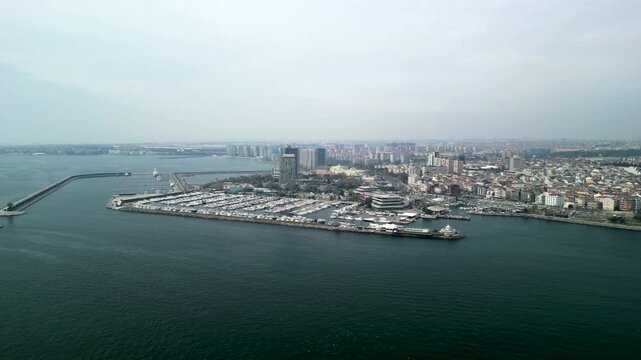 Atakoy Marina and Bakirkoy ferry with Istanbul city in the background fly above