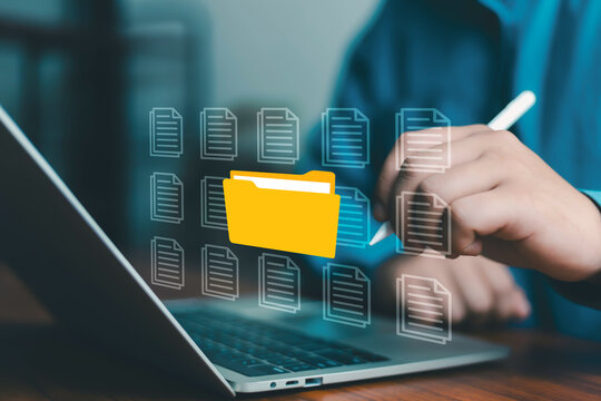 Digital document management concept with virtual files and folder system, user organizing data on tablet and laptop using stylus, cloud storage, file organization, data management workflow business