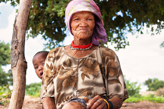 San Bushman Grandmother and Young Boy Portrait in Rural Kalahari Desert Botswana Southern Africa