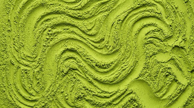green matcha powder creates a dynamic,green tea powder, showcasing a rhythmic pattern health, and natural energy