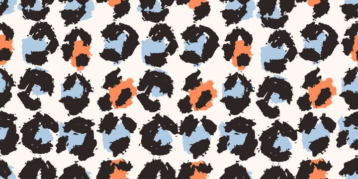 A seamless vector leopard pattern in black, cyan, orange on warm cream background with hand-painted spots