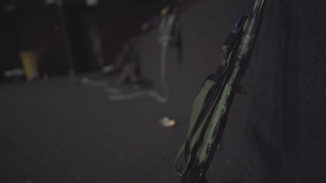 Customized AK-74 with Suppressor in Dark Staging Area