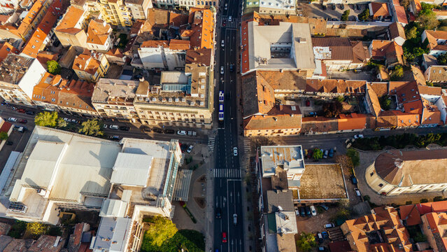 Aerial view of the historic Zemun district with its characteristic orange rooftops and a main street with traffic in Belgrade, City of Belgrade, Serbia.