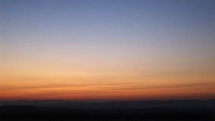 Fototapeta premium Serene twilight landscape with soft gradient sky, minimalistic natural scenery.