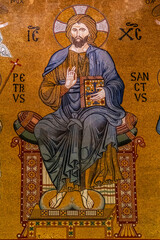 Fototapeta premium Christ Pantocrator holding the open Gospel, Palatine Chapel, Arab-Norman-Byzantine style, 12th century, Normans Palace , Palermo, Sicily, Italy