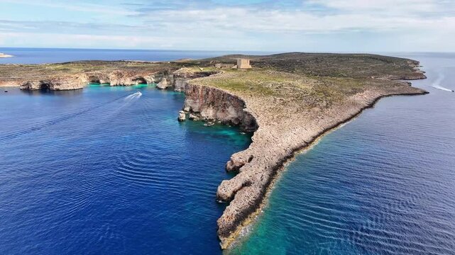 Lantern Point Ġebla tal Ponta Rqiqa Comino Għajnsielem Gozo and Comino District Malta southwestern tip with Upper Coralline Limestone cliffs and St Mary Tower built in 1618 above Mediterranean Sea