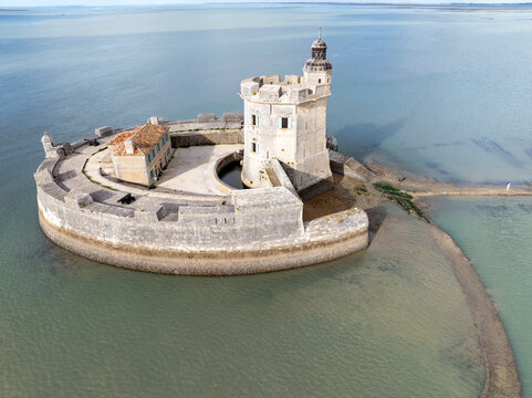 Aerial view of the imposing Fort Louvois stands resolute against the embracing sea, its stone walls echoing tales of centuries past, Bourcefranc-le-Chapus, France.