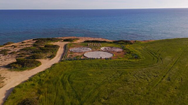Drone Flyover Toward Mediterranean Horizon Above Stone Circle Formations Near Avdimou Bay Cyprus