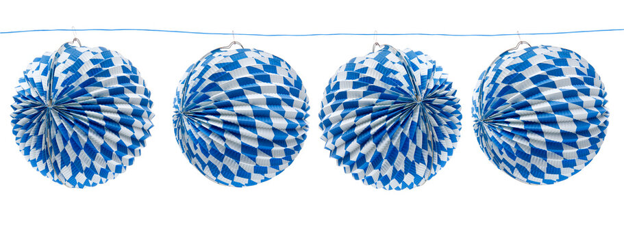 Blue and white lanterns isolated on a cord with a Bavarian diamond pattern