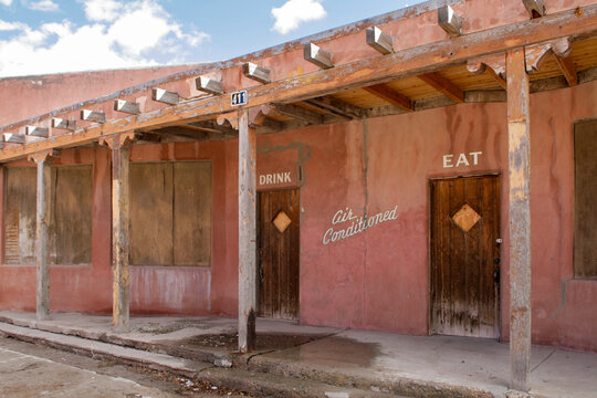 Adobe storefront with rustic doors