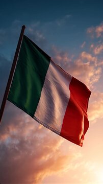 italy italian flag waving in the sky at sunset