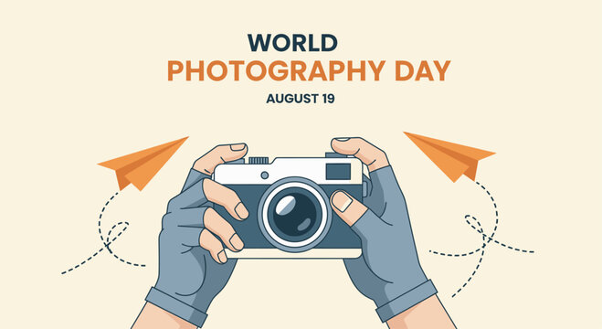 Hands in fingerless gloves holding a vintage camera with paper planes flying in the background for World Photography Day August 19 World Photography Day