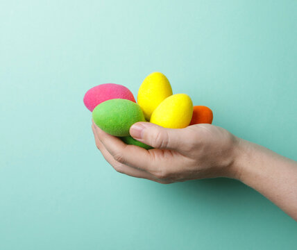 Spring time. hand holding colorful easter eggs. Easter. Spring. Photo. Decoration. 