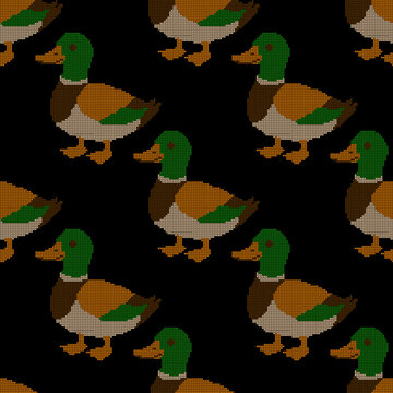 Seamless cross-stitch pattern featuring mallard ducks on a black background. Traditional embroidery style pixel art with wild birds, rustic farmhouse textile design for crafts, wallpaper, and apparel.