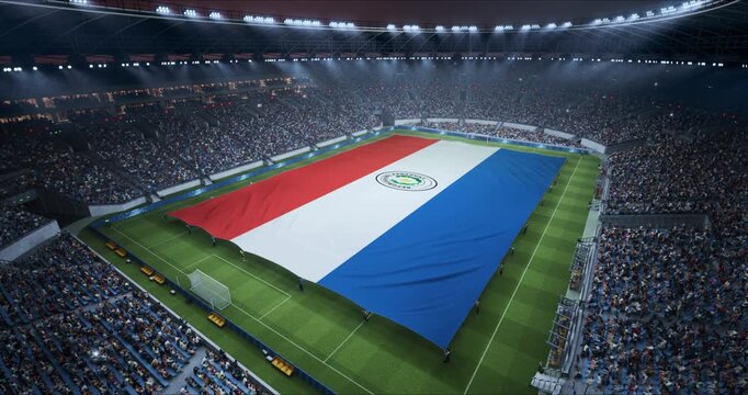 Professional Stadium With Soccer Game Championship With Flag of Paraguay Spread Across Pitch Before Football Match Start. Cheering Crowds of Fans at Arena for Anthem Ceremony. Aerial Static Wide Shot