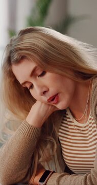 Yawn, tired and woman in home, student and burnout with deadline for assignment. Apartment, university and person in living room, exhausted and overworked with stress, fatigue and bored with project