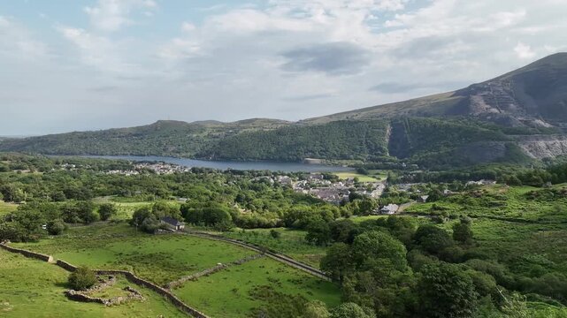 Aerial Drone Panorama of Llyn Padarn Lake and Llanberis Village in Snowdonia Wales