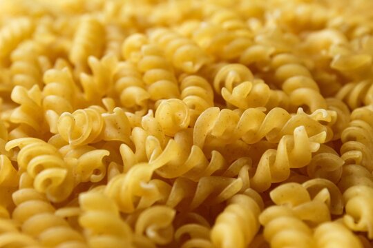 close up of fusilli pasta background