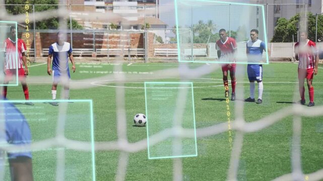 Penalty taker stepping and striking ball, sports HUD overlay marking goal zones while keeper diving