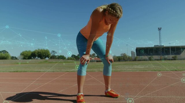 Child runner breathing on track postrun camera pulling back revealing body with sports hex overlay