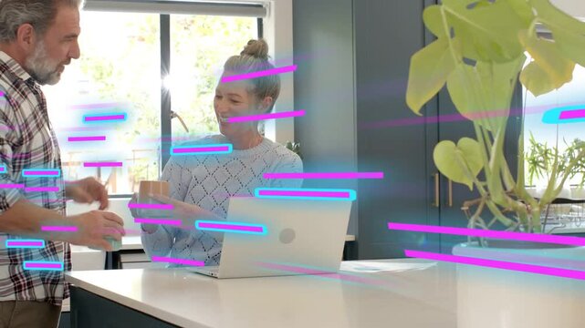 Man carrying mugs, handing mug to woman at island with laptop, work, magenta or cyan streaks sweep
