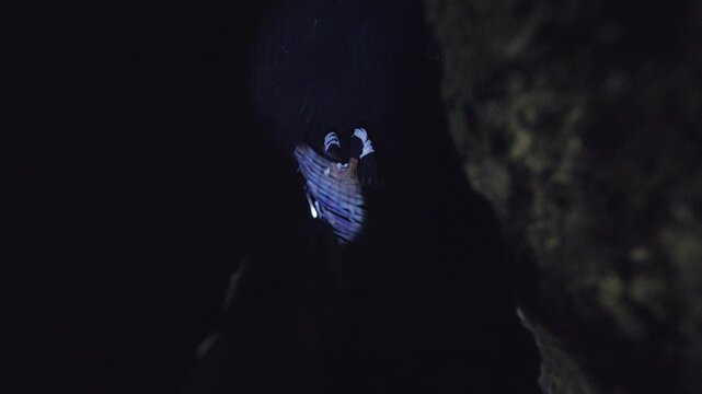Possessed Man Performing an Unsettling Dance in the Dark