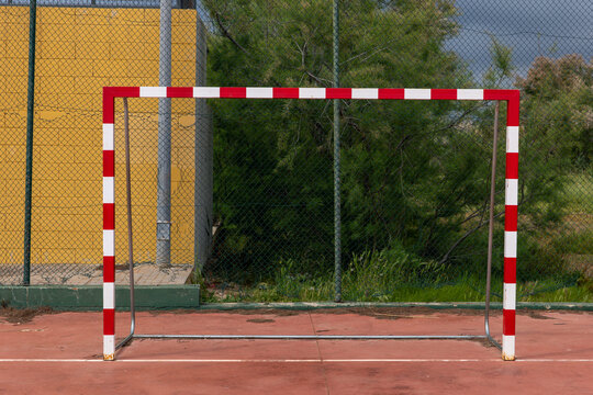 Red and White Soccer Goal for Youth Practice on Outdoor Field