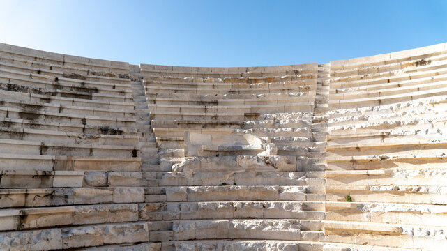Stone seating tiers and stage wall of the Lycian League Assembly theater at Patara archaeological site, Antalya, Turkey, world's first democratic parliamentary building.