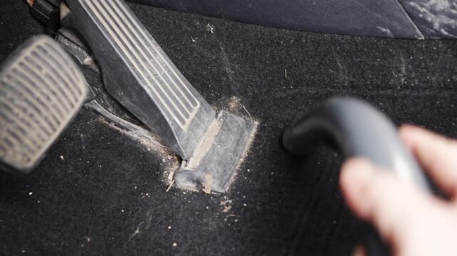 Dry vacuuming dirt from a car interior in four easy steps