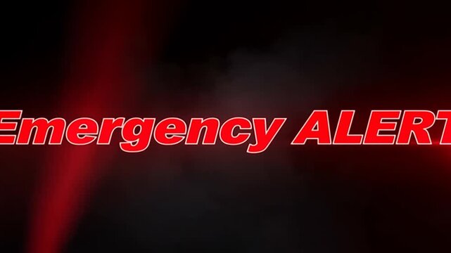Tracking shot of emergency alert text sliding across dark studio background with red flare smoke glowing light revealing breaking news banner