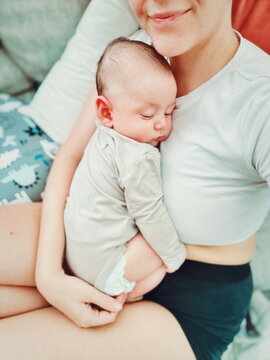 mother holding baby