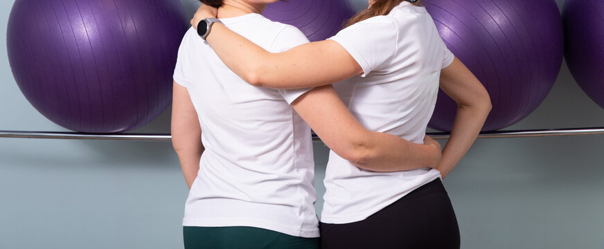 Two women having severe back and neck pain