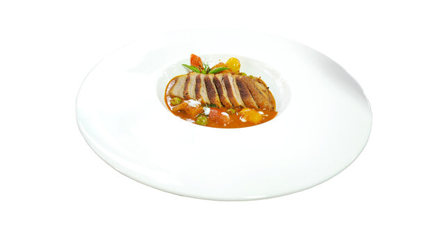 Authentic Thai roasted duck red curry (Gaeng Phed Ped Yang) in a modern white plate on white background.